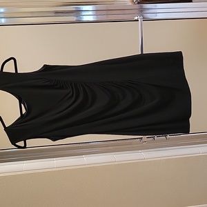 Versatile dress, go from work to casual to cocktails. Size 12